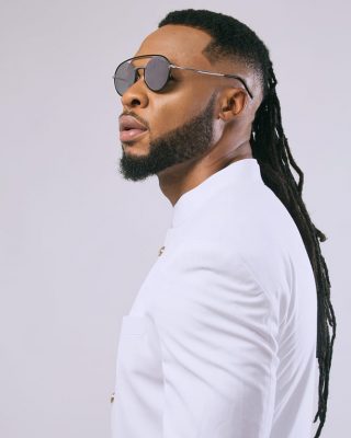 Lady Claims Flavour Is The Father Of Her Child, Dares Him To Come Out For DNA  