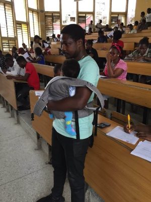 University Of Calabar Lecturer Seen Babysitting Student's Twins During An Exam  