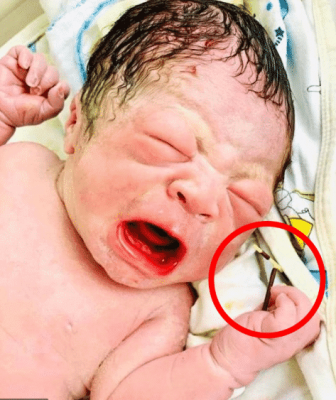 Newborn Baby Seen Holding Contraceptive That Failed To Stop His Pregnancy [PHOTOS]  