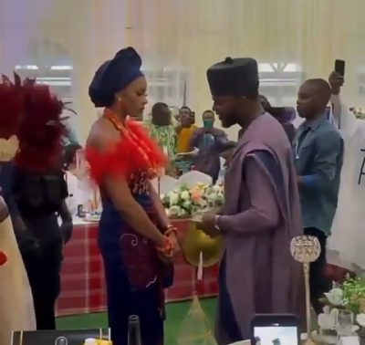 Bride Refuses To Smile As Husband Sprays Her Money [VIDEO]  