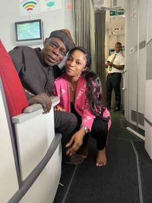 "Hook Up Things"; Toke Makinwa Dragged Over A Photo With Obasanjo  