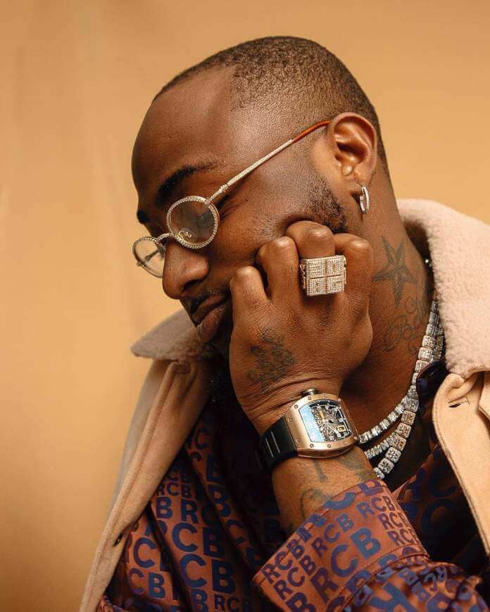 Davido Gifts A DMW Crew Member A Brand New Car [PHOTO]  