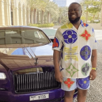 Man Seen Selling Picture Of Hushpuppi In Traffic [VIDEO]  