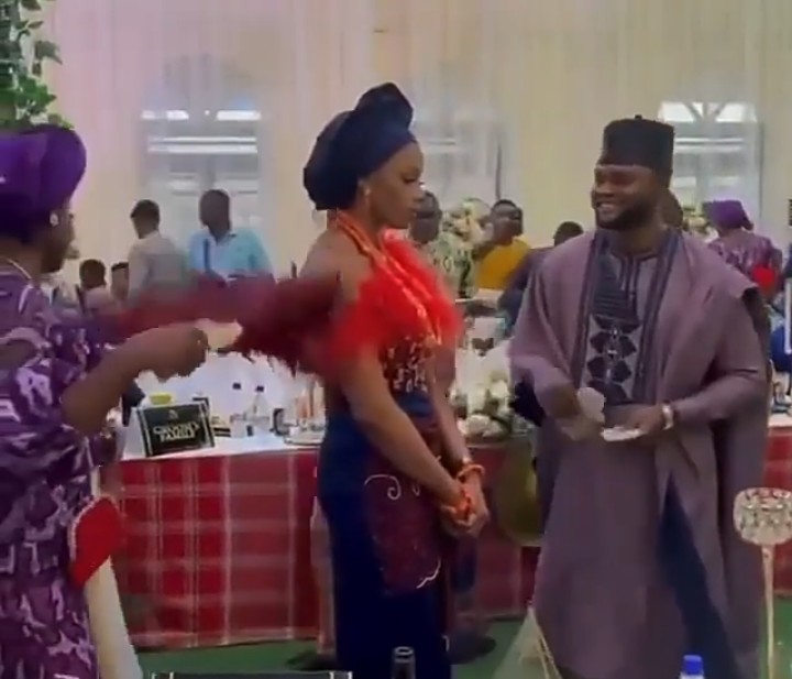 Bride Refuses To Smile As Husband Sprays Her Money [VIDEO]  