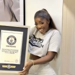 Nigerian Chef Hilda Baci Showcases Guinness World Record Plaque  